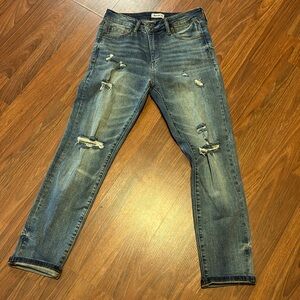 NWOT skinny jeans with light distressing size 9